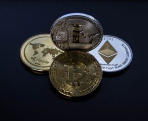 Quattro monete crypto: Bitcoin, Ethereum, Litecoin, Ripple